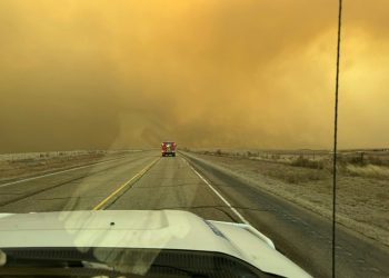 This handout picture courtesy of the Flower Mound Fire Department taken on February 27, 2024, shows a fire truck driving towards the Smokehouse Creek Fire, near Amarillo, in the Texas Panhandle. ©AFP