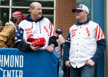 Supporters of former US president Donald Trump known as the Front Row Joes, including Scott Knuth (L) of Woodbridge, Virginia, wait in line to enter a rally in Richmond, Virginia, on March 2, 2024 / ©AFP