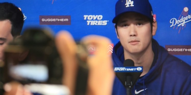 A screen grab of Los Angeles Dodgers ace Shohei Ohtani delivering a statement in his first remarks since his interpreter was accused of stealing from him last week . ©AFP