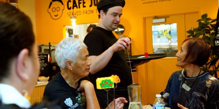 In the beating heart of New York business, Cafe Joyeux, an "inclusive" French chain of restaurants staffed by people with autism and Down's Syndrome, is setting up shop in the US . ©AFP