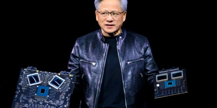 NVIDIA CEO Jensen Huang says chips powering artificial intelligence in datacenters have become systems containing tens of thousands if not hundrends of thousands of parts, many made in China. ©AFP