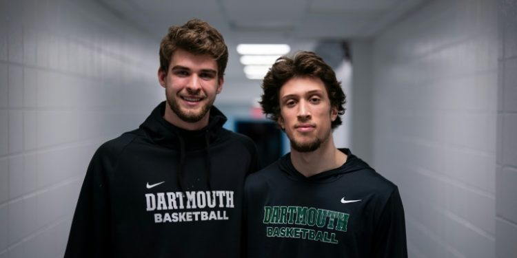 Cade Haskins, left, and Romeo Myrthil, right, were among those who led players on Dartmouth College's basketball team to vote to unionize as school employees. ©AFP