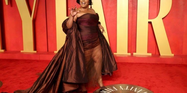 Pop star Lizzo, seen here attending the 2024 Vanity Fair Oscar Party, said she is "tired of putting up with being dragged by everyone in my life and on the internet". ©AFP