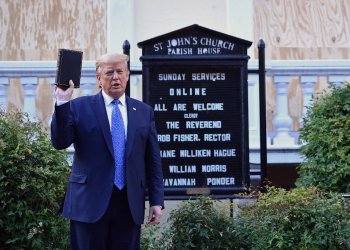 Then US president Donald Trump holds up a Bible outside of St John's Episcopal church near the White House in June 2020 after peaceful protesters were ejected from the area / ©AFP