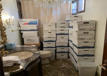 A photo attached to one of the indictments of Donald Trump shows stacks of boxes -- allegedly containing classified material -- in a bathroom at his Mar-a-Lago home in Florida / ©AFP