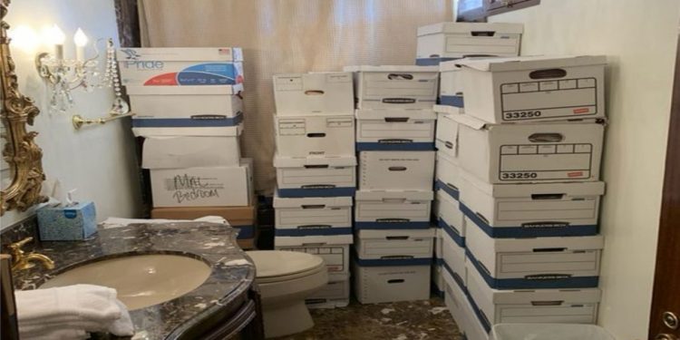 A photo attached to one of the indictments of Donald Trump shows stacks of boxes -- allegedly containing classified material -- in a bathroom at his Mar-a-Lago home in Florida / ©AFP