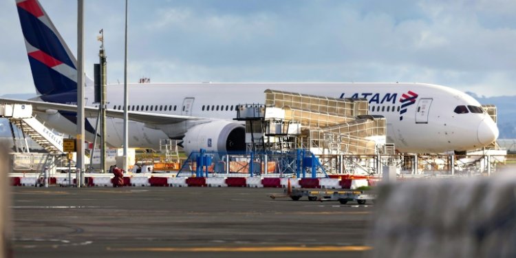 The LATAM Airlines Boeing 787 Dreamliner plane that suddenly lost altitude mid-flight, dropping violently and injuring dozens of travellers, is seen on the tarmac of the Auckland International Airport on March 12, 2024. ©AFP