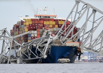 Footage of the collision showed packed container ship the Dali slamming into one of the bridge's supports, causing the 47-year-old structure to collapse. ©AFP