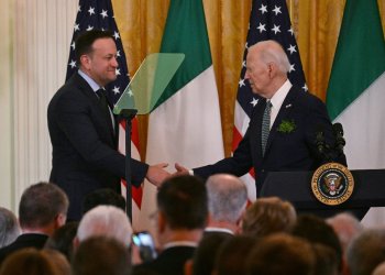 US President Joe Biden (R) shakes hands with Taoiseach of Ireland Leo Varadkar during a St. Patrick’s Day Celebration in the East Room of the White House in Washington, DC, on March 17, 2024 / ©AFP