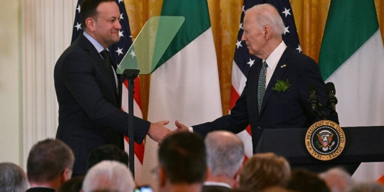 US President Joe Biden (R) shakes hands with Taoiseach of Ireland Leo Varadkar during a St. Patrick’s Day Celebration in the East Room of the White House in Washington, DC, on March 17, 2024 / ©AFP