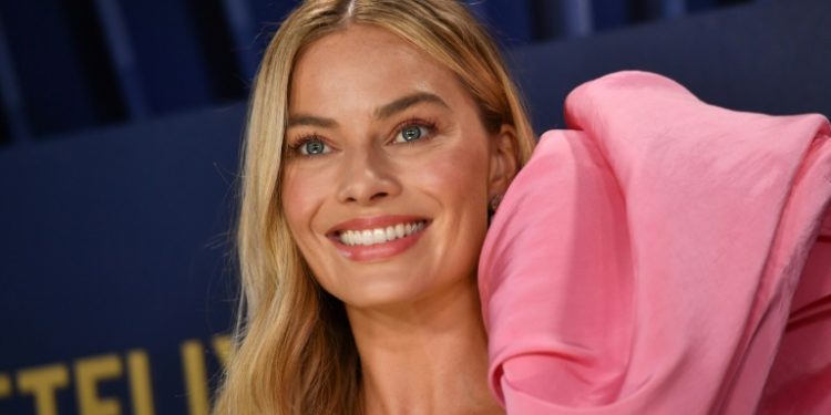 Margot Robbie starred in the $1.4 billion-grossing 'Barbie', which took the box office by storm, but a new report found only a third of top films had a female lead. ©AFP