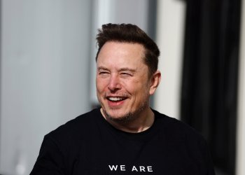 Tesla CEO Elon Musk is pictured during a visit at the company's electric car plant in Gruenheide near Berlin on March 13, 2024 / ©AFP