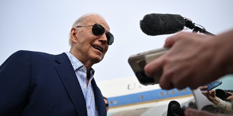 US President Joe Biden speaks to the press before boarding Air Force One at Joint Base Andrews  / ©AFP