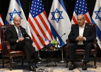 US President Joe Biden listens to Israel's Prime Minister Benjamin Netanyahu as he joins a meeting of the Israeli war cabinet  in Tel Aviv on October 18, 2023 / ©AFP