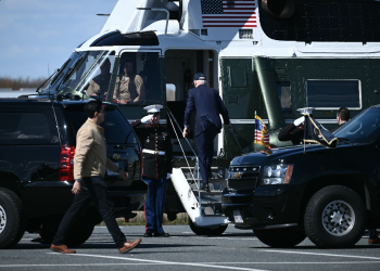 US President Joe Biden boards Marine One at Gordons Pond in Rehoboth Beach, Delaware, as he returns to the White House on April 13, 2024 / ©AFP