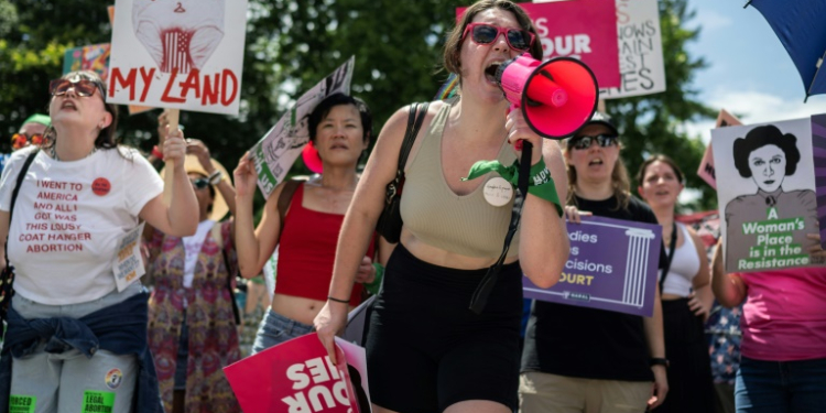 Abortion rights demonstrators rally to mark the first anniversary of the US Supreme Court ruling in the Dobbs v Women's Health Organization case in Washington, DC on June 24, 2023. ©AFP