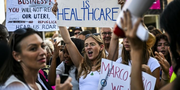 Abortion rights activists rally after the US Supreme Court striked down the right to abortion, in Miami, Florida, on June 24, 2022. ©AFP