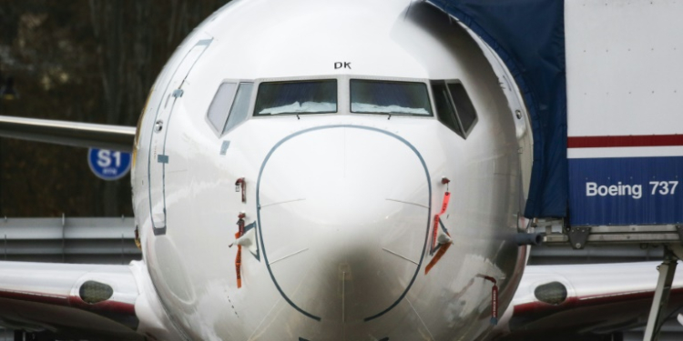 Boeing reported another loss as it slows output in response to safety concerns . ©AFP