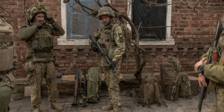 Ukrainian soldiers from the 23rd Mechanized Brigade prepare to head toward the frontline in the Donetsk region on April 3, 2024. ©AFP