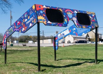 The City of Dripping Springs, Texas is preparing for the solar eclipse with a set of larger than life glasses on display at Veterans Memorial Park. ©AFP