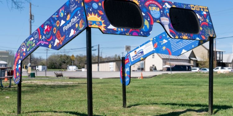 The City of Dripping Springs, Texas is preparing for the solar eclipse with a set of larger than life glasses on display at Veterans Memorial Park. ©AFP