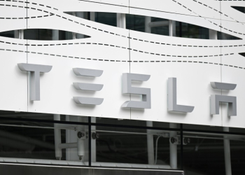 A string of disappointments have raised the stakes for for Tesla's first-quarter earnings announcement . ©AFP