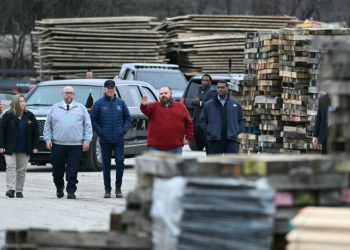 US President Joe Biden in February visited the site of a major freight train wreck in East Palestine, Ohio, that spewed toxic chemicals, prompting the company to settle numerous lawsuits for $600 million. ©AFP