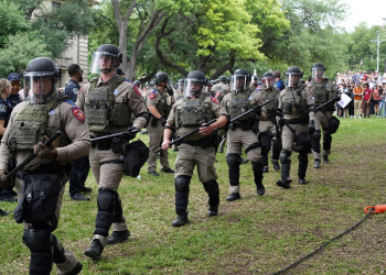 Texas state troopers walk on the campus of the University of Texas as pro-Palestinian students protest the Israel-Hamas war in Austin on April 24, 2024 / ©AFP