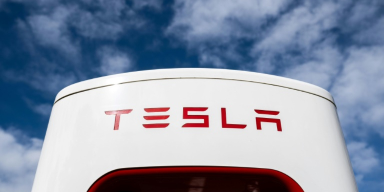 Tesla is cutting hundreds of more jobs in part of Elon Musk's latest cost-cutting push. ©AFP