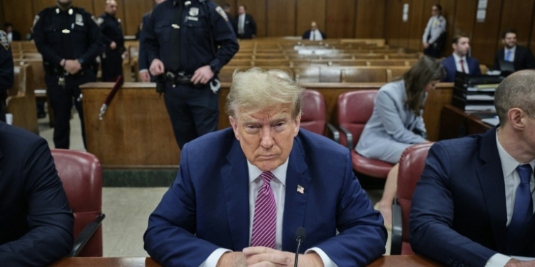 Former US president Donald Trump arrived in court complaining about gag order banning him from attacking court staff, witnesses and others involved in his trial, which he calls a 'hoax'. ©AFP