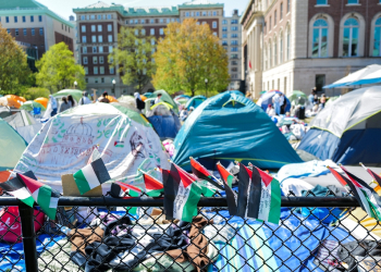 Palestinian flags are seen around the encampment on the campus of Columbia University in New York City on April 23, 2024 / ©AFP