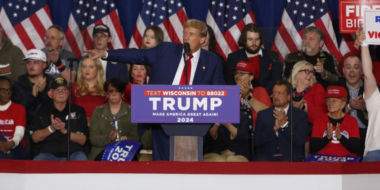 Former US President and 2024 presidential hopeful Donald Trump speaks during a campaign rally at the Hyatt Regency in Green Bay, Wisconsin, on April 2, 2024 / ©AFP