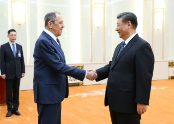 China and Russia said they would strengthen strategic cooperation as Foreign Minister Sergei Lavrov (L) held talks with President Xi Jinping (R) and top diplomat Wang Yi. ©AFP