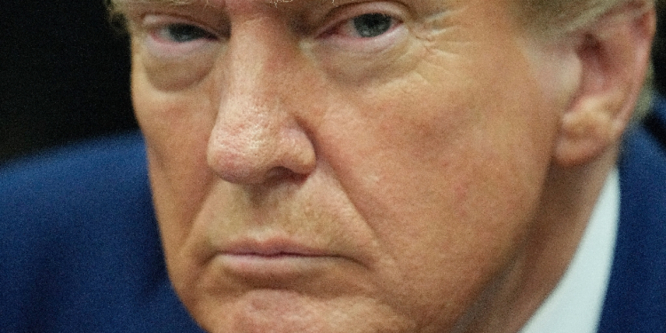 Former US President Donald Trump looks on in the courtroom, during his trial for allegedly covering up hush money payments linked to extramarital affairs, in New York City, on April 29, 2024.  Trump, 77, is accused of falsifying business records to reimburse his lawyer, Michael Cohen, for a $130,000 hush money payment made to porn star Stormy Daniels just days ahead of the 2016 election against Hillary Clinton. / ©AFP