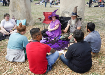 People gather to watch a total solar eclipse across North America, at Stonehenge II at the Hill Country Arts Foundation in Ingram, Texas. ©AFP