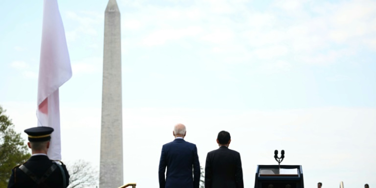 US President Joe Biden and Japanese Prime Minister Fumio Kishida attend an Official Arrival Ceremony on the South Lawn of the White House in Washington, DC, April 10, 2024.. ©AFP