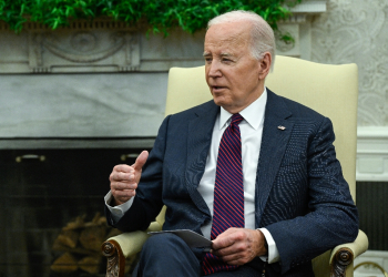 Joe Biden and his wife Jill Biden earned $619,976 in 2023, most of which was derived from the president's $400,000 salary / ©AFP