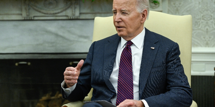 Joe Biden and his wife Jill Biden earned $619,976 in 2023, most of which was derived from the president's $400,000 salary / ©AFP