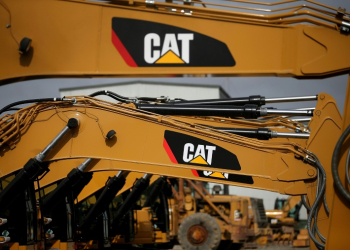 Caterpillar made record payouts to shareholders in the first quarter on the strength of price hikes that boosted profits . ©AFP