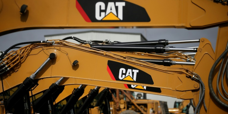 Caterpillar made record payouts to shareholders in the first quarter on the strength of price hikes that boosted profits . ©AFP