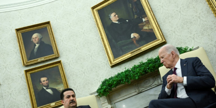 US President Joe Biden meets with the Prime Minister of Iraq Mohammed Shia al-Sudani in the Oval Office of the White House in Washington, DC, on April 15, 2024. ©AFP