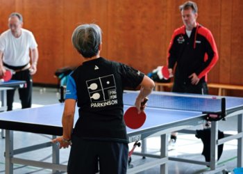 People play table tennis at the Ping Pong Parkinson initiative in Berlin on April 11, 2023, World Parkinson's Day -- the devastating disorder affects 10 million people worldwide. ©AFP