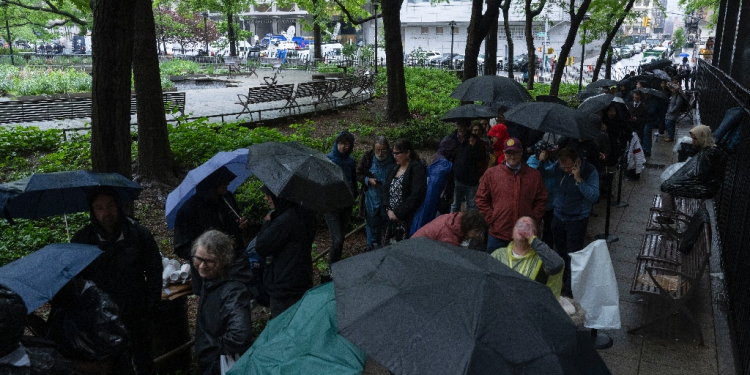 On hard wooden benches, the public spectators have joined around 50 journalists and Trump's entourage of Republican grandees / ©AFP