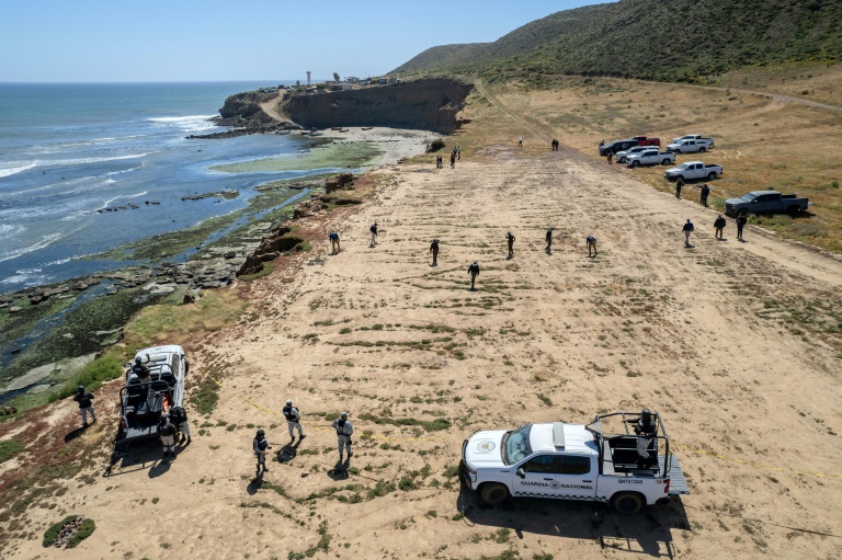 State prosecutors search the camping site of two Australians and an American murdered during a surfing trip to Mexico. ©AFP