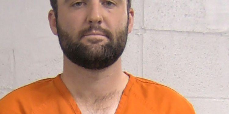 Louisville police handcuffed and booked Scottie Scheffler on multiple charges including assaulting a police officer, and took his mugshot with him dressed in an orange prison jumpsuit. ©AFP