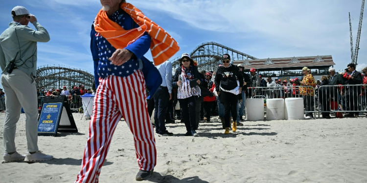 Diehard fans of former president Donald Trump had traveled from as far afield as Hawaii to attend his rally in Wildwood, New Jersey, with some camping out on a beach / ©AFP