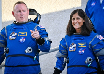 Astronauts Butch Wilmore and Suni Williams were set to blast off at 10:34 pm Monday (0234 GMT Tuesday) -- clad in Boeing's bright blue spacesuits, the pair had waved goodbye to their families before boarding a van to the launch tower . ©AFP