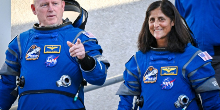 Astronauts Butch Wilmore and Suni Williams were set to blast off at 10:34 pm Monday (0234 GMT Tuesday) -- clad in Boeing's bright blue spacesuits, the pair had waved goodbye to their families before boarding a van to the launch tower . ©AFP