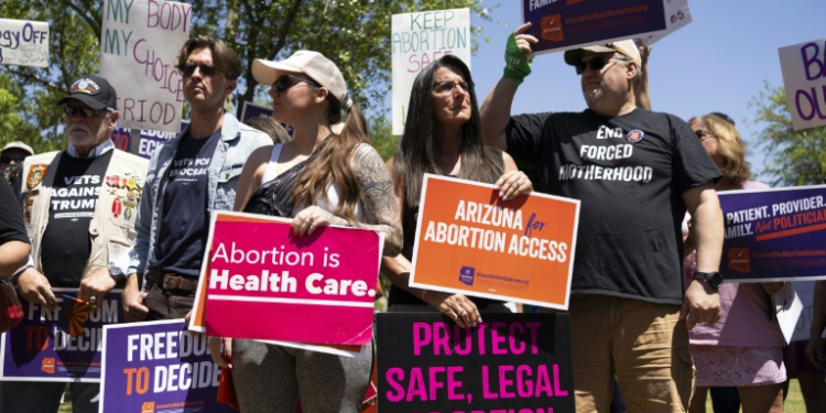 Protesters condemn Arizona's 1864 abortion ban at the state House of Representatives in April 2024 in Phoenix. ©AFP