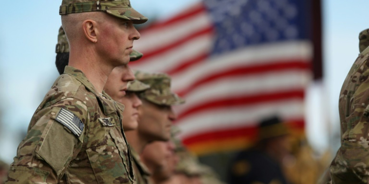 Soldiers bound for Afghanistan stand at parade rest during a departure ceremony on November 4, 2011 in Fort Carson, Colorado. ©AFP